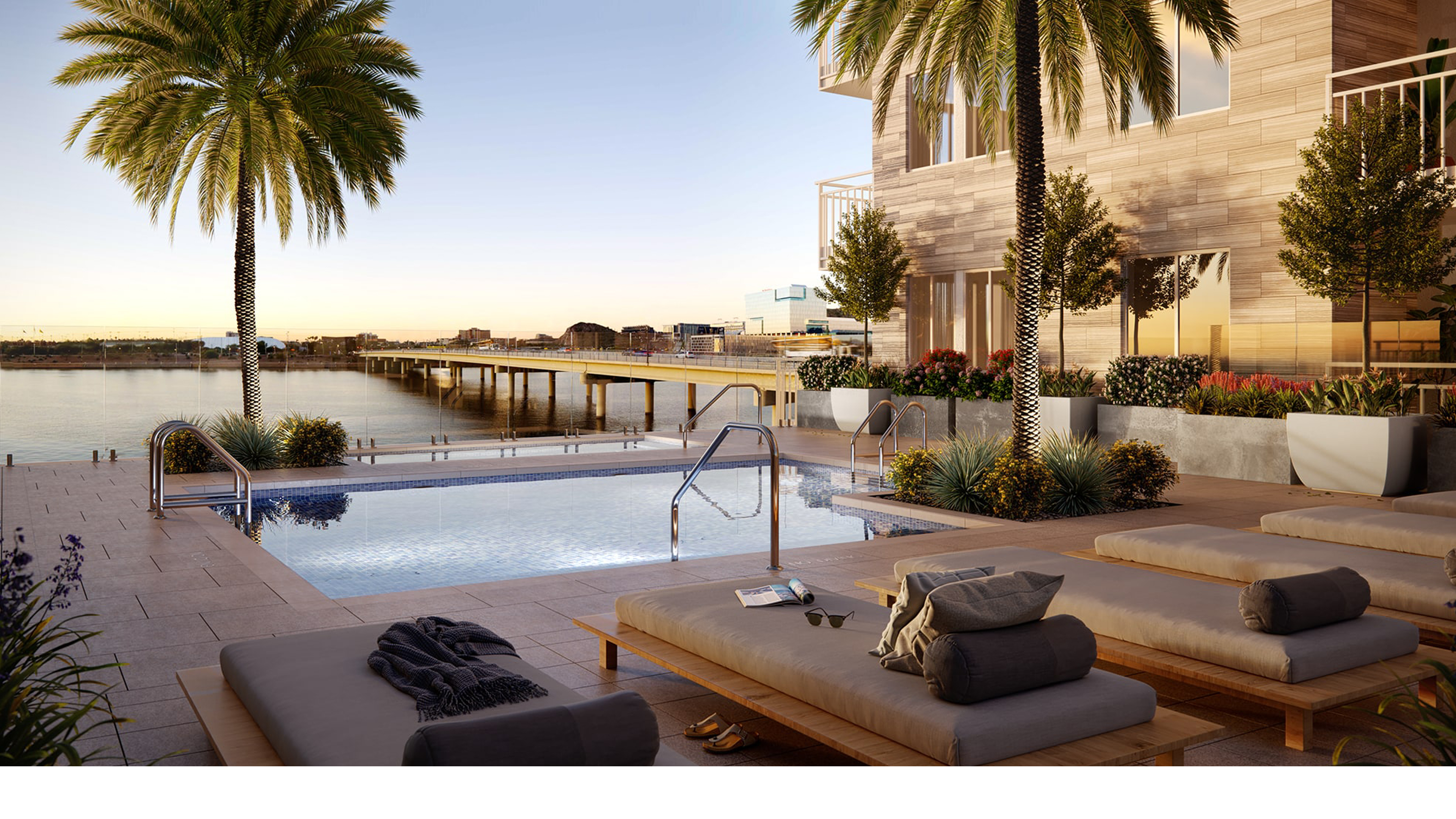 pool deck with river view and seating areas at Jefferson Town Lake Tempe Arizona